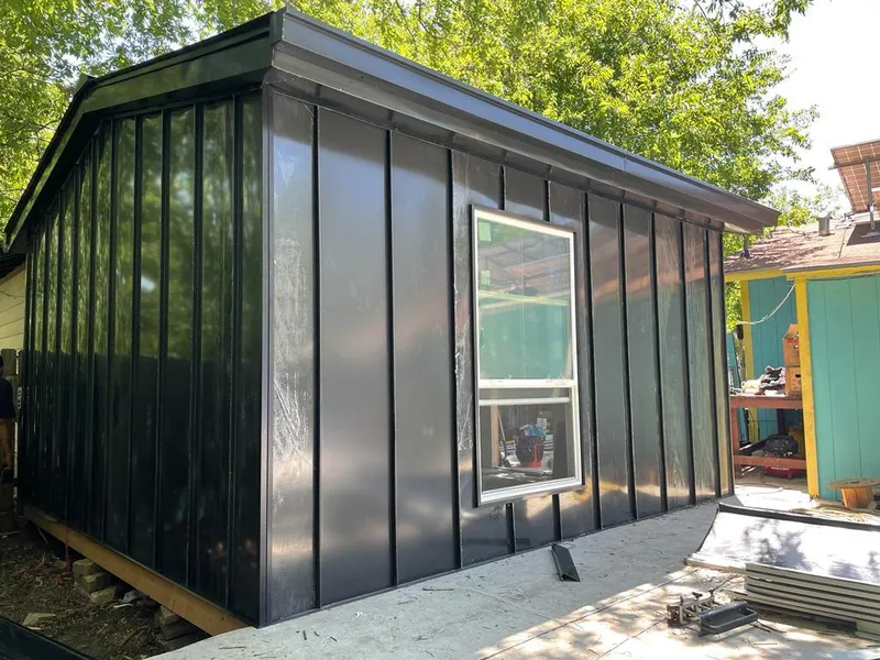 Black standing seam metal wall panels for Metal Roof Installation in West Goshen